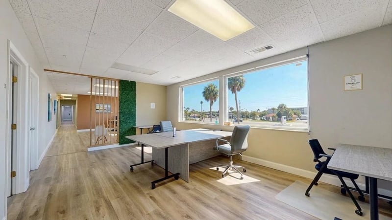 Shared workspace at Cocoa Beach Office