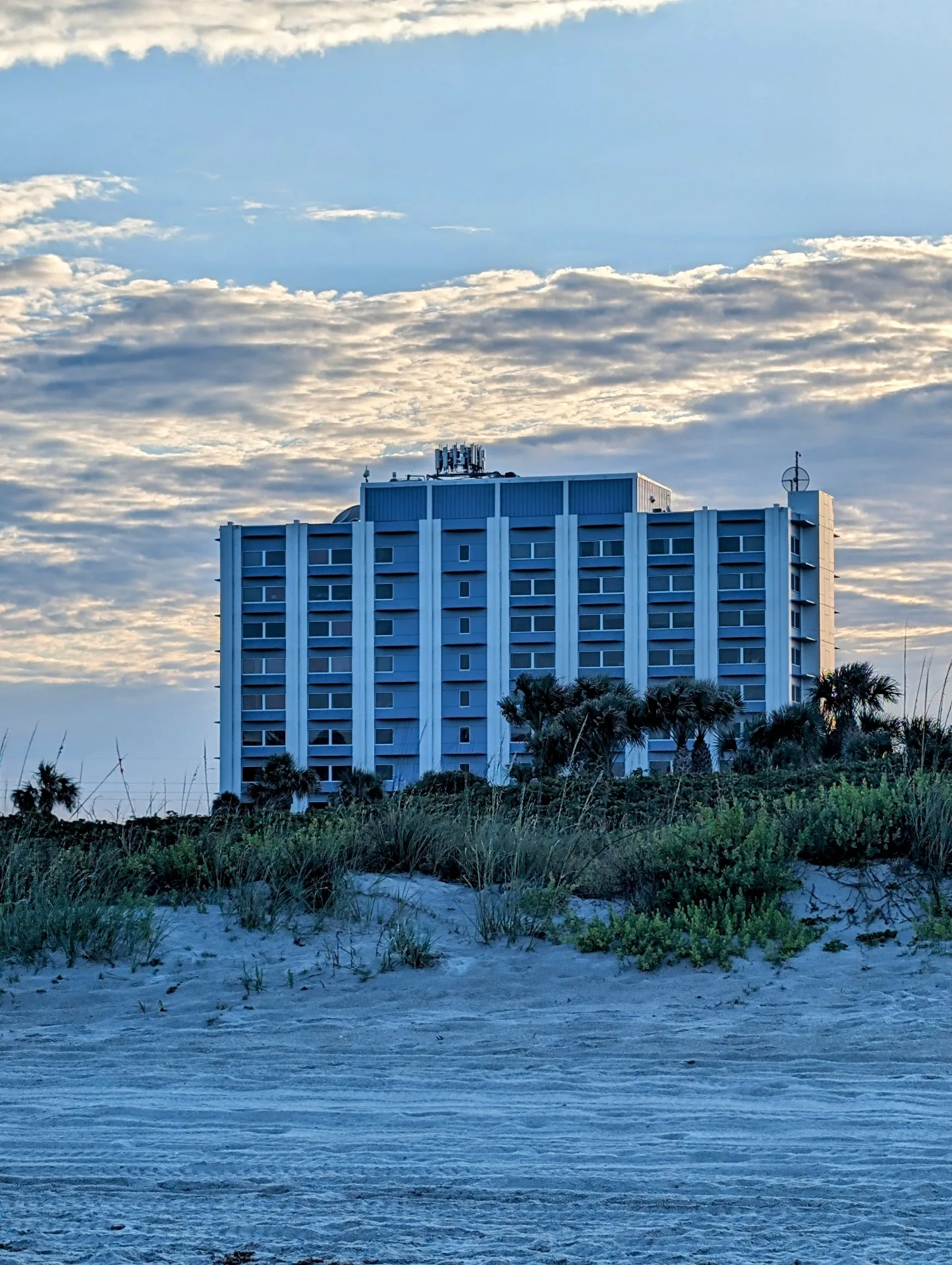 Cocoa Beach Office building at 1980 N Atlantic Ave, seen from the beach dunes in Cocoa Beach, Florida